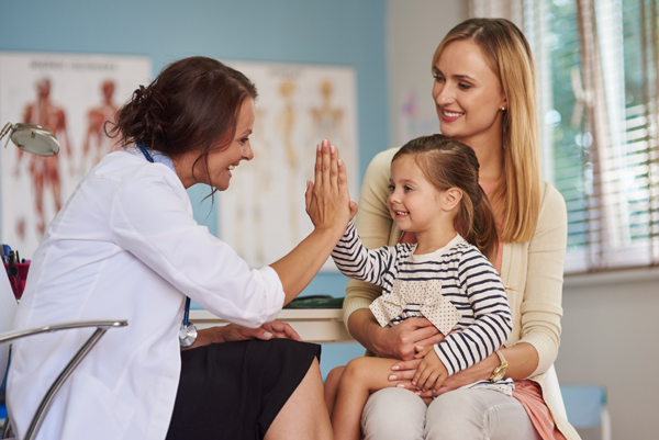 family doctor with child and mother